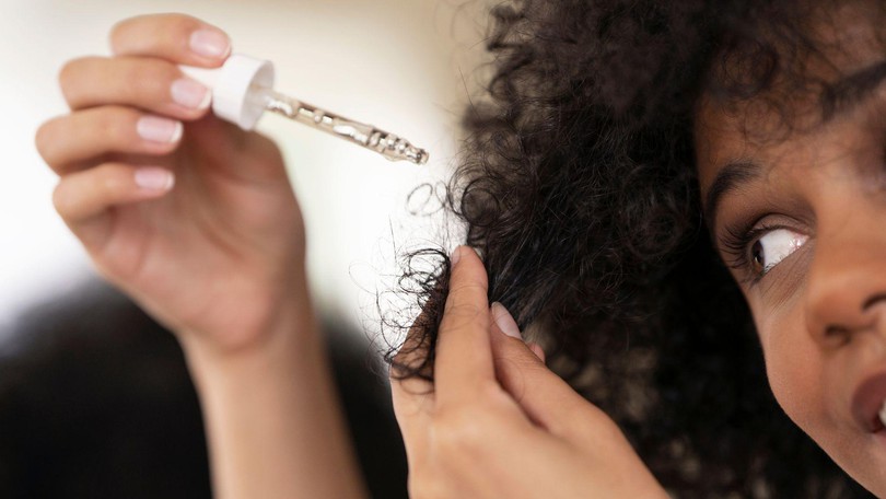 Applying Hair Oil Canva