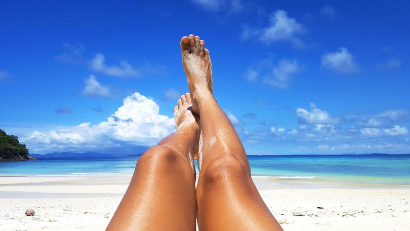 Legs Tanning In Sun Canva